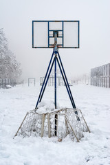 Fototapeta premium Basketball court covered with snow