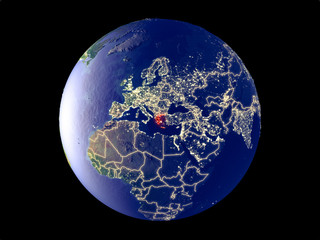 Naklejka premium Greece from space on model of planet Earth with city lights. Very fine detail of the plastic planet surface and cities.