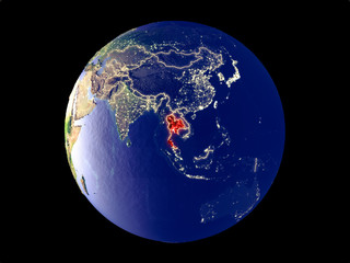 Thailand from space on model of planet Earth with city lights. Very fine detail of the plastic planet surface and cities.