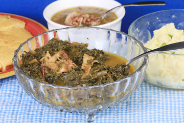 Collard Greens Seasoned with Bacon Fat on Family Style Table
