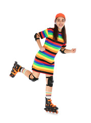 Young woman in bright dress with inline roller skates on white background