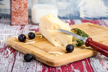 cheese and wine grapes on table