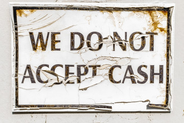 Fototapeta premium Sign on wall saying cash only business