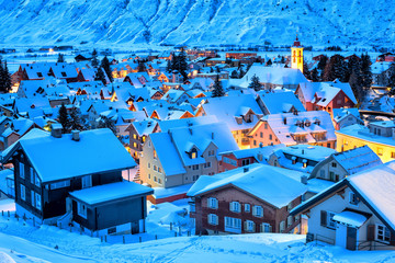 Fototapeta na wymiar Andermatt village in the Alps mountains, snow covered in winter, Uri, Switzerland