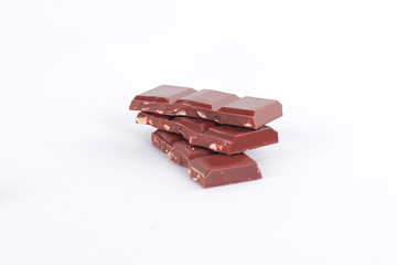milk chocolate with nuts isolated on white. photo with copy space
