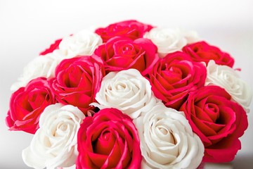 Red and White roses bouquet as a gift on St Valentine's Day isolated on a white background, view from above