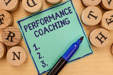 Handwriting text Performance Coaching. Concept meaning Facilitate the Development Point out the Good and Bad.