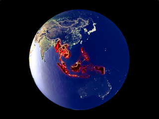 ASEAN memeber states from space on model of planet Earth with city lights. Very fine detail of the plastic planet surface and cities.