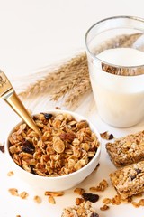 Homemade Granola in a bowl on white background, selective focus