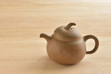 Tea pot on a wooden table


