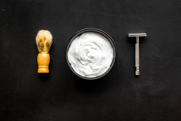 barbershop desk with tools for male care dark background top view