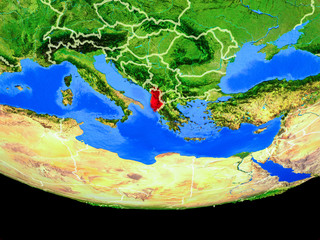 Albania from space on model of planet Earth with country borders.