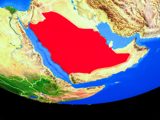 Saudi Arabia from space on model of planet Earth with country borders.