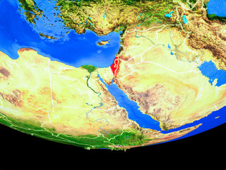Israel from space on model of planet Earth with country borders.