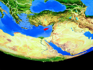 Cyprus from space on model of planet Earth with country borders.