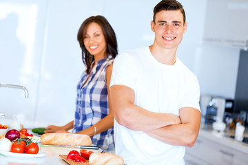 Couple cooking together at home