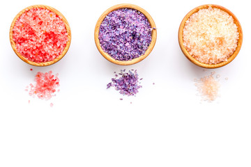 Colorful bath salt pink and violet on white background top view space for text