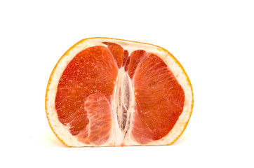 Fresh whole and sliced grapefruit on white background.