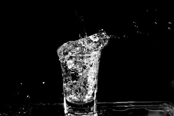 Water splash from the transparent glass