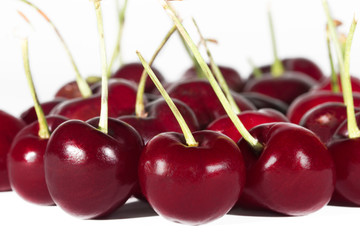 Cherries Close-up on a White Backdrop