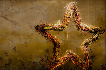 Stern aus Stroh und Holz verträumt