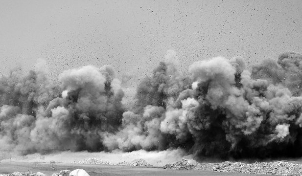 Flying Rock Particles After The Blast On The Construction Site