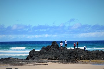 Group of tourists at  ocean beach.Phillip Island.Victoria.Australia