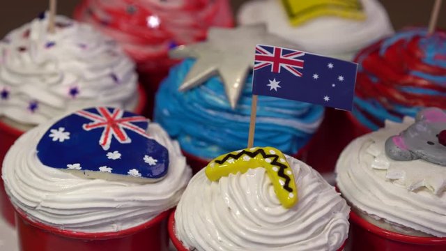 Australian themed cupcakes for a party. Flag, kangaroo road sign, boomerang, seven-pointed star, koala