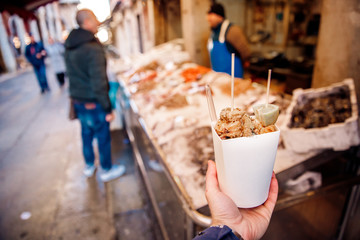 Seafood market, fresh catch exposed on ice counter, Venice
