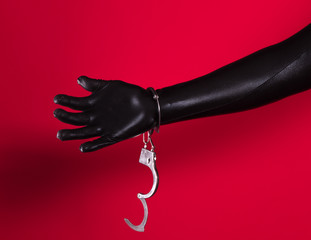 handcuffed fetish hands in latex