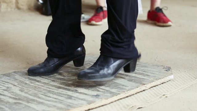 Male Flamenco dancer tapping the floor close-up