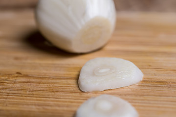 Closeup of a sliced garlic glove