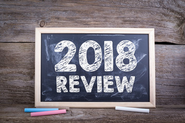 2018 review concept. Chalk board, communication Background