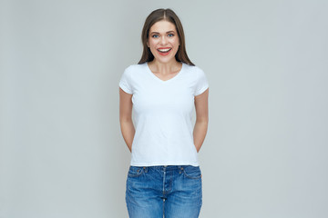 Happy woman dressed casual white t shirt with copy space.