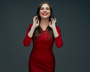 portrait of smiling woman in red dress