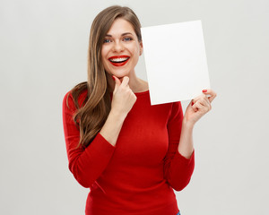Smiling woman holding white board