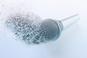 Exploding microphone bursting disperse in pieces fragments