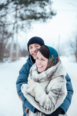 young couple in   winter for   walk.