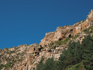 Fototapeta na wymiar Landscape picture. Caucasian mountains against the sky
