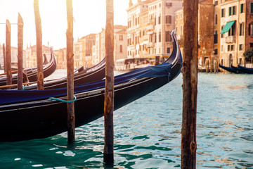Fototapeta na wymiar Canal with gondolas in Venice, Italy. Sunny day. romantic travel.