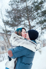 Fototapeta na wymiar young couple in winter for walk.