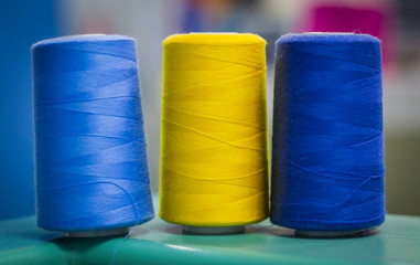 colored threads in reels