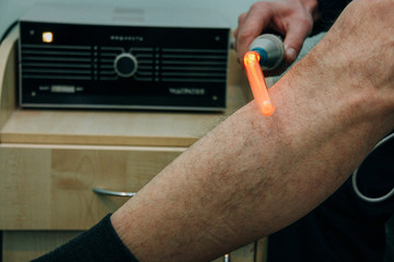 Man receiving laser treatment