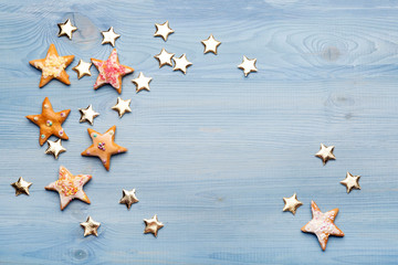 Gingerbread cookies on blue background