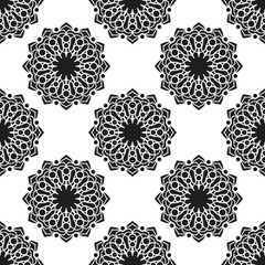 Seamless pattern with abstract flowers. Fashion textile print. Asian fabric background. Vector monochrome design. Perforation floral holes.