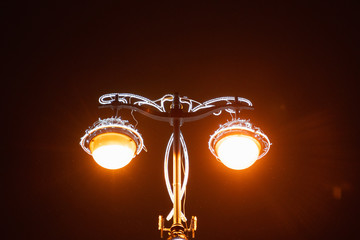 city street lamp decorated for Christmas