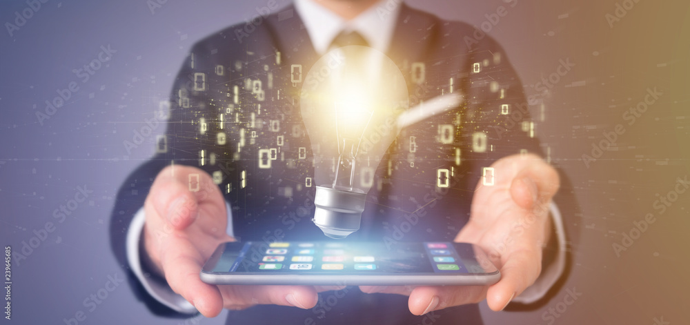 Aufkleber businessman holding a bulb lamp idea concept with data all around 3d rendering