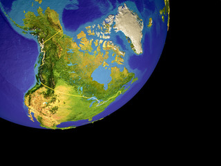 North America from space on model of Earth with country borders. Very fine detail of the plastic planet surface and blue oceans.