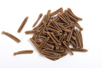 casarecce of legume pasta on white background