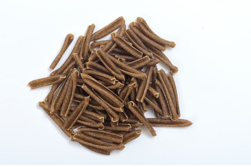 casarecce of legume pasta on white background